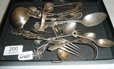 Lot 200 - Assorted silver flatwares including two ladles, teaspoons, sugar tongs etc