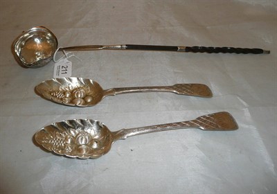 Lot 211 - A pair of George III later decorated silver berry spoons and a silver and whale bone toddy...