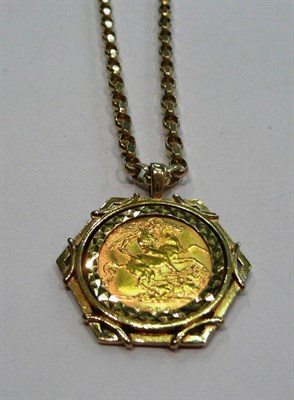 Lot 215 - A 1914 half sovereign mounted as a pendant, on a 9ct gold belcher chain