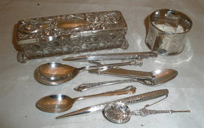 Lot 217 - Silver mounted glass dressing table box, two silver pens, spoons etc
