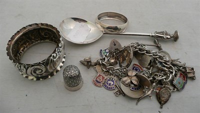 Lot 220 - Silver apostle spoon, silver charm bracelet, silver thimble and two silver napkin rings