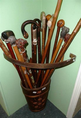 Lot 223 - Seventeen walking sticks, canes and shepherd's crooks, in a wooden container