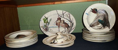 Lot 234 - Collection of hand painted creamware Wedgwood plates, bowls and a platter decorated with fish...