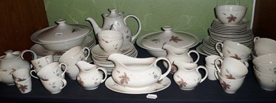 Lot 235 - A Royal Doulton 'Tumbling Leaves' pattern dinner, tea and coffee service, twelve place setting