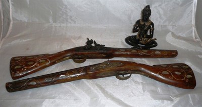 Lot 252 - Bronze figure of an Indian lady seated and two ornamental guns