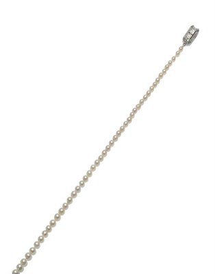 Lot 359 - A Cultured Pearl Necklace, the graduated cultured pearls knotted to an Art Deco clasp, set with...