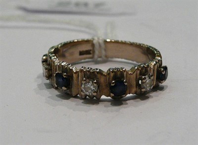 Lot 287 - An 18ct white gold sapphire and diamond ring