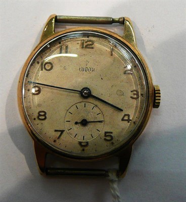 Lot 317 - A 9ct gold Tudor wristwatch face