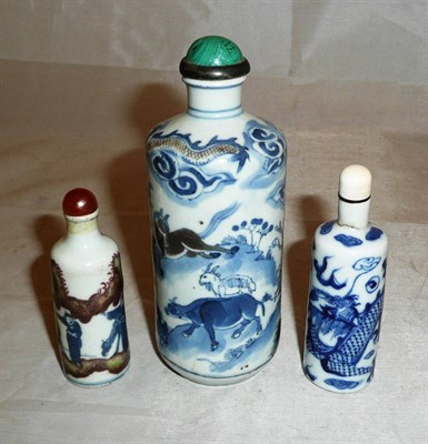 Lot 333 - Three Chinese blue and white porcelain snuff bottles, including a large specimen painted with...