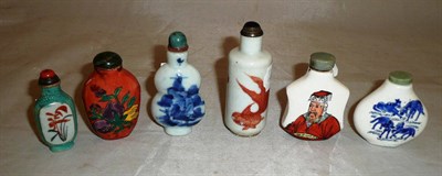 Lot 334 - Six Chinese porcelain snuff bottles, decorated in underglaze blue, others with enamels,...