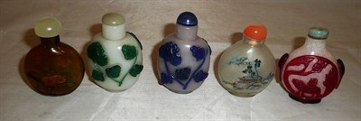 Lot 337 - Three Chinese two-colour cameo glass snuff bottles, and two internally painted examples, all...