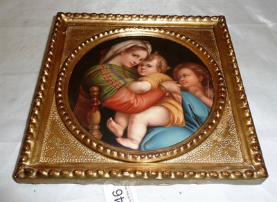 Lot 346 - A Continental porcelain circular plaque, late 19th century, decorated with the Holy Family...