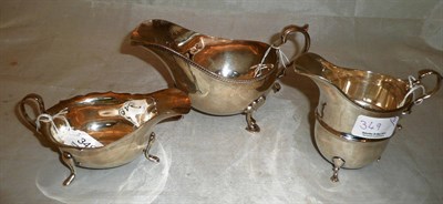 Lot 349 - Two silver sauce boats and a cream jug (3)