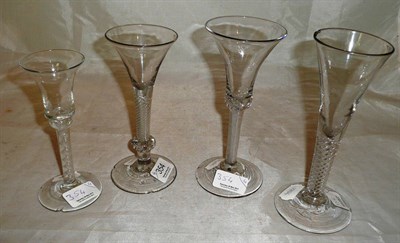 Lot 354 - A group of four 18th century air-twist wine glasses (a.f.)