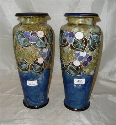 Lot 365 - A pair of Doulton stoneware Art Nouveau vases by Florrie Jones