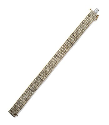 Lot 369 - A Diamond Cuff Bracelet, round brilliant cut diamonds in white claw settings, set in...