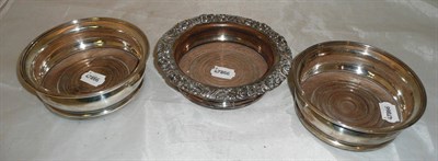 Lot 377 - Pair of silver decanter stands and a plated example