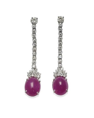 Lot 370 - A Pair of 18 Carat White Gold Ruby and Diamond Drop Earrings, a row of round brilliant cut diamonds