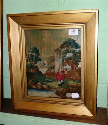 Lot 467 - An early 19th century silk and wool embroidered picture of a young girl within landscape, in a gilt