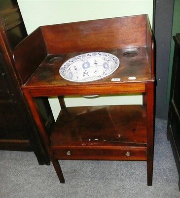 Lot 494 - A late George III mahogany washstand with gallery back and modern blue and white washbowl