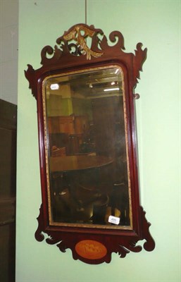 Lot 495 - Mahogany framed fret carved wall mirror