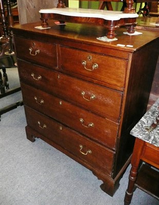 Lot 514 - Georgian oak straight front chest of two short and three long drawers