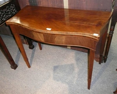 Lot 550 - George III mahogany tea table