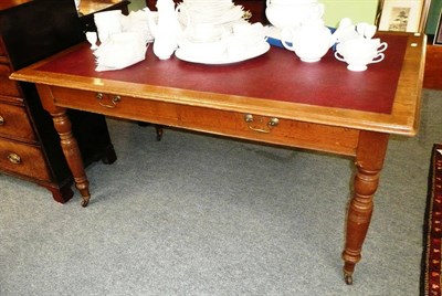 Lot 554 - Late 19th century oak writing table