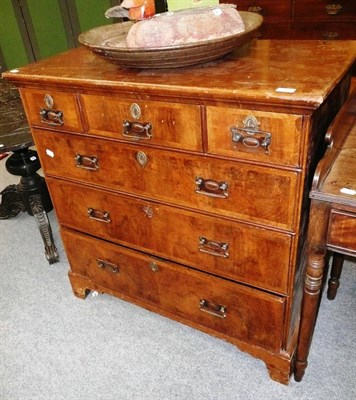 Lot 558 - A part 18th century walnut and later chest of drawers (a.f. with alterations)