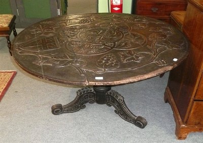 Lot 559 - 19th century carved oak circular top pedestal table