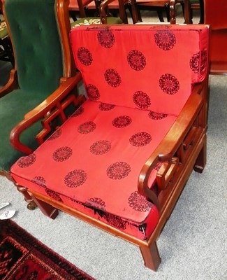 Lot 580 - Chinese style carved chair with loose cushions