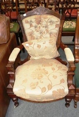 Lot 582 - Victorian walnut upholstered open armchair