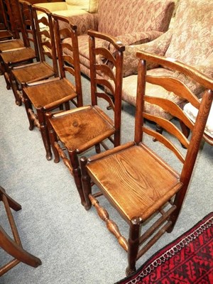 Lot 589 - Composite set of six early 19th century ash and elm ladderback chairs