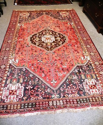 Lot 600 - Kashgai Rug, South West Persia - The faded rose pink field with central medallion framed by...