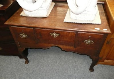 Lot 612 - 18th century low boy with three frieze drawers