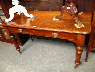 Lot 619 - A Victorian oak two drawer side table