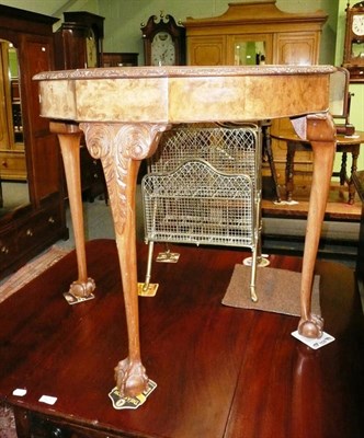 Lot 624 - A reproduction walnut demi-lune side table