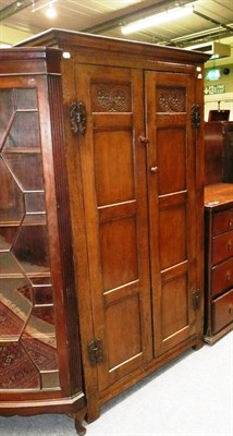 Lot 632 - Oak reproduction two door wardrobe