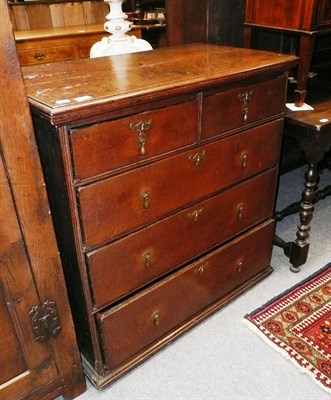 Lot 634 - An 18th century oak straight front chest of drawers