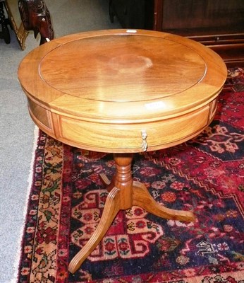 Lot 650 - Reproduction occasional table modelled as a drum table