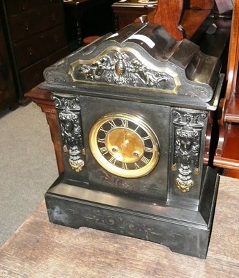 Lot 652 - A black slate mantle clock