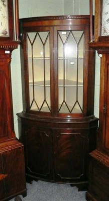 Lot 660 - Reproduction mahogany glazed corner cabinet