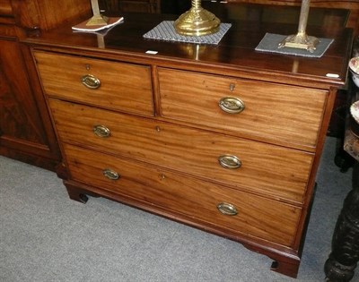 Lot 669 - A 19th century mahogany chest of two short and two long drawers