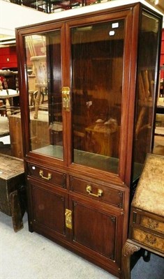 Lot 728 - Chinese style glazed cabinet