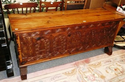 Lot 811 - Carved pitch pine coffer