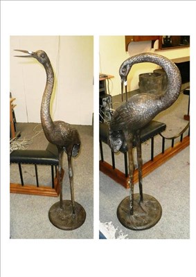 Lot 849 - A pair of bronzed metal herons