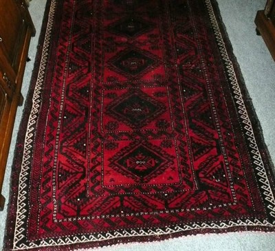 Lot 675A - Baluch rug Persian/Afghan Frontier The compartmentalised field with six latch hook medallions 222 x