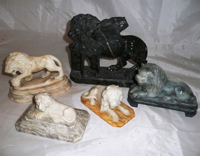 Lot 20 - A group of five carved marble, alabaster and other mineral models of lions, 19th century and later