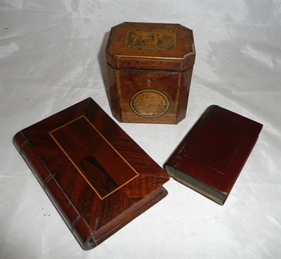 Lot 25 - A George III yew wood single division tea caddy, the lid with a print of a street scene, the...