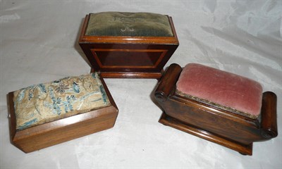 Lot 30 - A Victorian sarcophagus shaped pin cushion and two others (3)